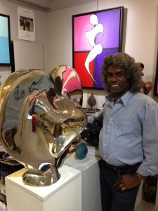 Artist Mike Anthony with his bronze of "The Idiot and the Odyssey."