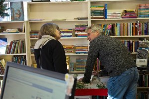 Signing and dedicating "The Idiot and the Odyssey II: Myth, Madness and Magic on the Mediterranean". (Photo: John Boyden)