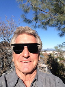 Shielding my dilated eyes from the strong afternoon sunlight.