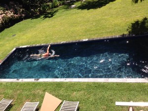 Working out in Gordon Kling's backyard pool.