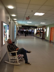Catching some zzzzs in the Boston airport due to a delayed flight. (Photo: Liz Chapin)