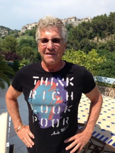 A sponsor in France presents The Idiot with a new range of MedTrekking Ts. (Photo: Charles Eisenhour)