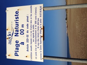 The on-the-sand entry to Le Cap d'Agde informs The Idiot that he's now on a Naked Beach.