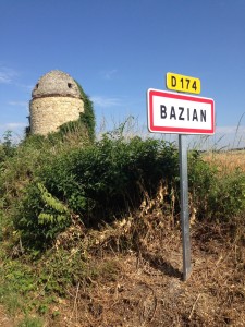 Passing a windmill at the entrance to Bazian.