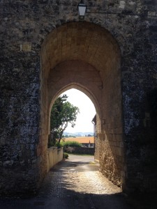 View of the countryside through a Bazian archway.