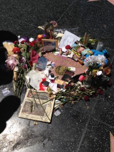 Candles, flowers, sketches, cards, dolls and photos were left by fans. 