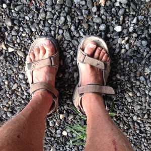 He needs a new pair of hiking sandals.