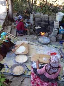 Watching women knead dough and prepare gözleme near Mersin, Turkey.