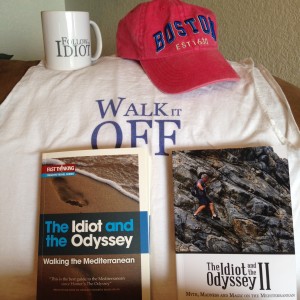 Books, shirts, cups and caps accompany The Idiot.