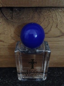 The sacred holy water has been blessed by Benedictine monks at Glastonbury Abbey to, the Idiot was told, "wash away your cares."