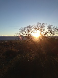 The sun rises over cloud-obscured Mount Lassen after the Pineapple Express rainstorm moves out of Northern California.