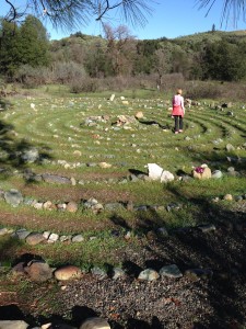Liz Chapin mindfully walks the circular 500-yard Peace Labyrinth path.