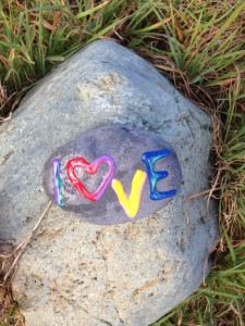 A colorful rock that The Idiot left two years ago has had part of the "L" knocked out of it.