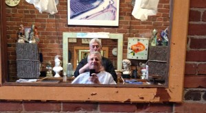 Yuba Street: The Idiot stops by Mike's Barber Shop in the old Lorenz Hotel to have his hair blown dry after a pool workout.
