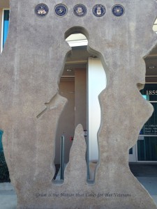 The inscription reads "Great is the Nation that Cares for Her Veterans."