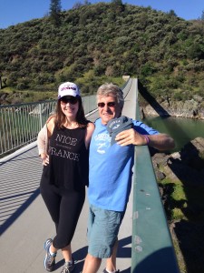 Crossing the Ribbon Bridge on the Sacramento River Trail with his daughter-in-law Samantha Dunnachie. (Photo: Luke Stratte-McClure)