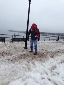 A "raw, ugly, foul" Saturday includes dirty snow on Gloucester's uncrowded boardwalk. (Photo: Liz Chapin)