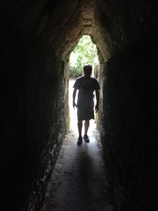 The Idiot investigates a Mayan tunnel. (Photo: Liz Chapin)