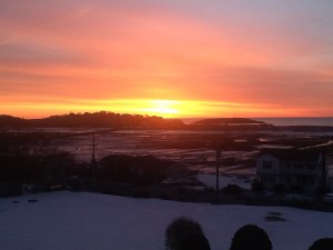 6:41 am in Gloucester, MA: "Sun and moon divide the sky, Fragrance blooms on pear wood bones, Earth awakens with a sigh,  Wanderer revels on the path alone. It is the time of the equinox, when day and night are briefly equal." -- 365 Daily Tao Meditations