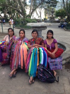 The Idiot delighted these four women by telling them they are the  "quatro mas bellas senoras in Guatemala" and, more importantly, buying three scarves.
