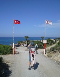 The red Turkish flag with a white crescent and white star frequently flies in tandem with the white TRNC flag with with a red crescent and red star.