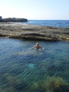 He swam laps at a lava beach west of Girne/Kyrenia in the Turkish Republic of North Cyprus.