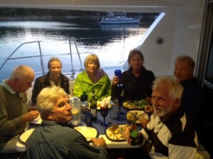 Sea-cooked food Enjoying a very social on-the-boat dinner. (Photo: Liz Chapin)