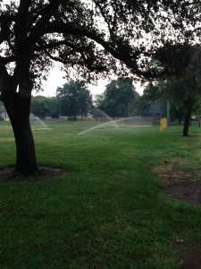 The baseball field in Martin Luther King, Jr. Park in Redding, CA, is watered at 6 am. 