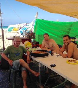 A plea for a cup of coffee led to a breakfast of shakshuka (a dish of eggs poached in a tomatoes, chili, peppers and onion sauce) and an hour-long discussion of the Israeli penchant for communal tent life on the beach. (Photo: Michael Knipe)