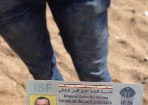 The Idiot asked the Internal Security Forces agent who arrested him for spying on a beach north of Tyre in Lebanon to prove that he was actually an undercover  cop. The Idiot  later  promised his interragators that he would not reveal the agent's identity. Hence the cropped photo.