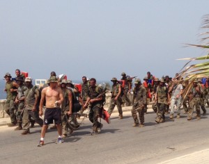 The Internal Security Forces were very upset that The Idiot took this shot of sweaty troops on a 100-kilometer hike on the Mediterranean Sea. He replied that "they were on a public road and no one told me not to photograph them." Of course, no one notice him taking the photo. 