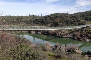 The 13-foot-wide, 420-foot-long concrete-stressed ribbon pedestrian bridge across the Sacramento River was the first of its kind in the United States. It represents the half-way point on a six-mile loop.