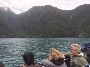 The Idiot with other tourists on a boat exploring Milford Sound.