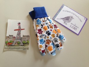 The morning mail included a postcard from Paris, an invitation to an April party in Vermont, and some paw-patterned spring gardening gloves from the animal-protecting Humane Society of the United States.