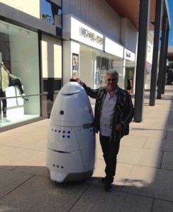 The Idiot literally runs into the 300-pound, 5-feet tall Knightscope K5 security guard as they both stroll through the Stanford Shopping Center. The robots were developed in nearby Mountain View in the wake of the shooting at Connecticut's Sandy Hook Elementary School.