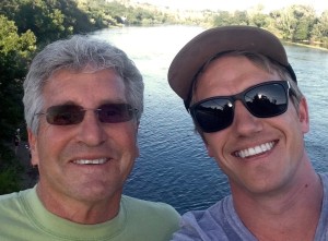 Walking with his son Luke across the Sacramento River.