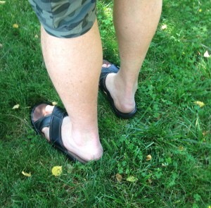 The Idiot wears sturdy low-cut hiking shoes or strapped walking sandals when MedTrekking. But to recover from spinal surgery by taking three 10-minute walks a day on flat terrain, slide sandals solve the problem of being unable to bend over to tie shoes or attach straps. Thanks to his daughter Sonia for the bright idea. (Photo: Luke Stratte-McClure)