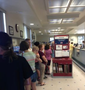 Patiently standing in line at the US Post Office in Redding, CA, to buy some Shirley Temple stamps.