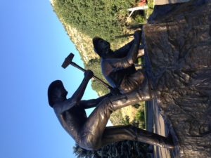 A sculpture honors workers at the bygone Durango Smelter.