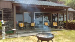 The Idiot burns a mix of different woods in a fire pit with a robust fire that creates hot, glowing coals just right for roasting and toasting marshmallows when guest arrive at his Humboldt County base camp.