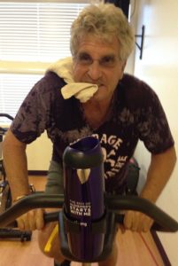 The Idiot's first real sweat of the day occurs during a spinning class in a fan-filled room. (Photo: Liz Chapin)