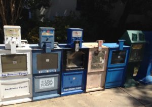 Newsracks are being removed in most US cities due to lack of sales  but Redding, CA, is keep the empty newspaper racks on the streets as part of a local antique roadshow tour.
