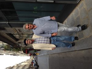 Strolling on l'Ile Saint Louis, where he lived from 1976-82, with John Keeney, the publisher of The Idiot and the Odyssey: Walking the Mediterranean.