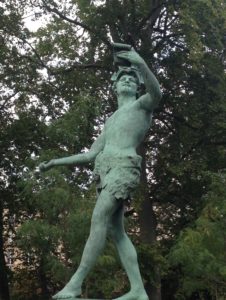 Would it surprise anyone that the statue of a Greek actor is completely absorbed about taking a selfie while acting and posing in Luxembourg Gardens?