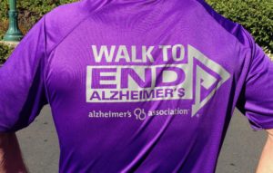 Switching his high school purple-and-white colors for Alzheimer purple.