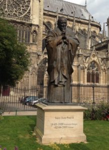 ...Saint Jean-Paul in the gardens of Notre Dame Cathedral.