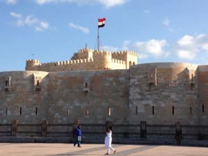 Two Egyptians walking at the Citadel of Qaitbay in Alexandria.
