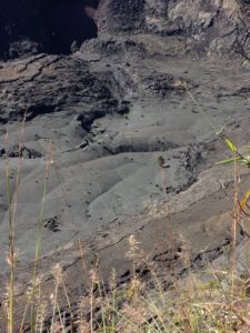 Hikers appear to be ants as The Idiot & Co. descend on the trail into the Kilauea Iki crater.