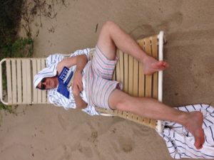 The Idiot's son chills on Hapuna Beach.